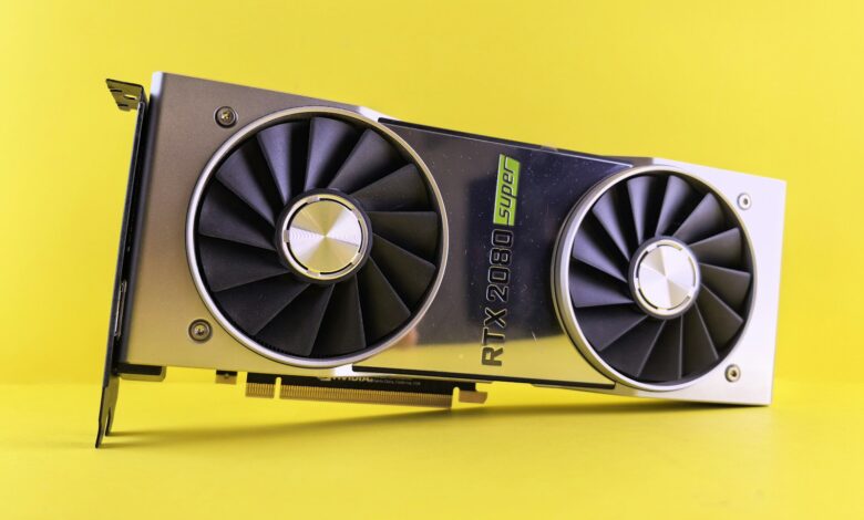 A close up of a video card on a yellow background