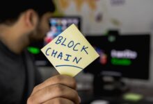 person holding sticky note