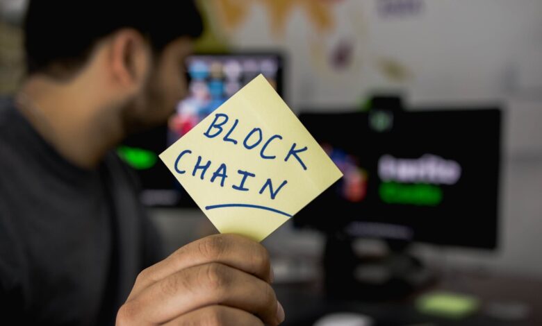 person holding sticky note